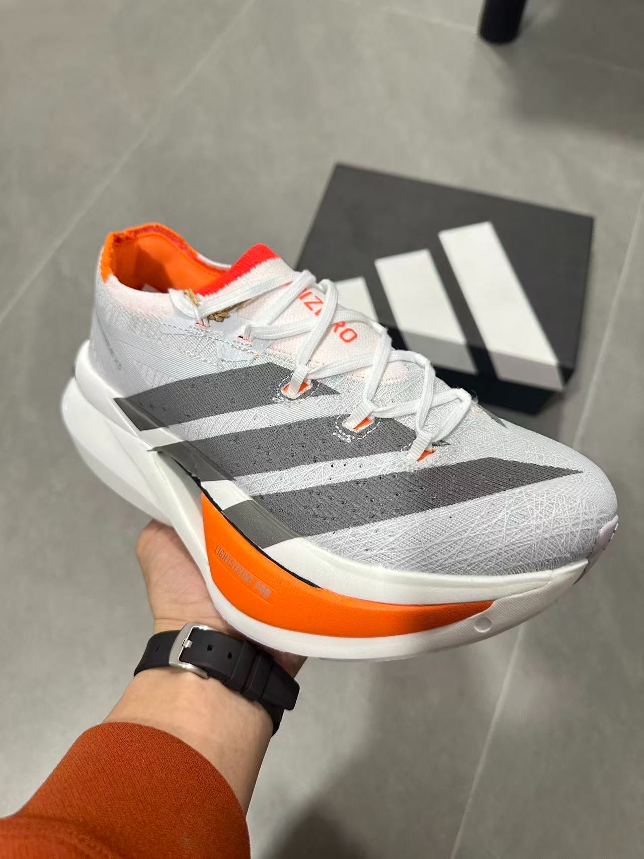 Adidas ADIZERO PRIME X3 STRUNG (Cloud White / Grey / Solar Red colorway) Shoes